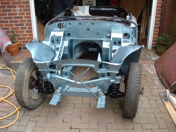 Once back home rear axle and front suspension were fitted to make life easier to move the chassis in and out to work on.